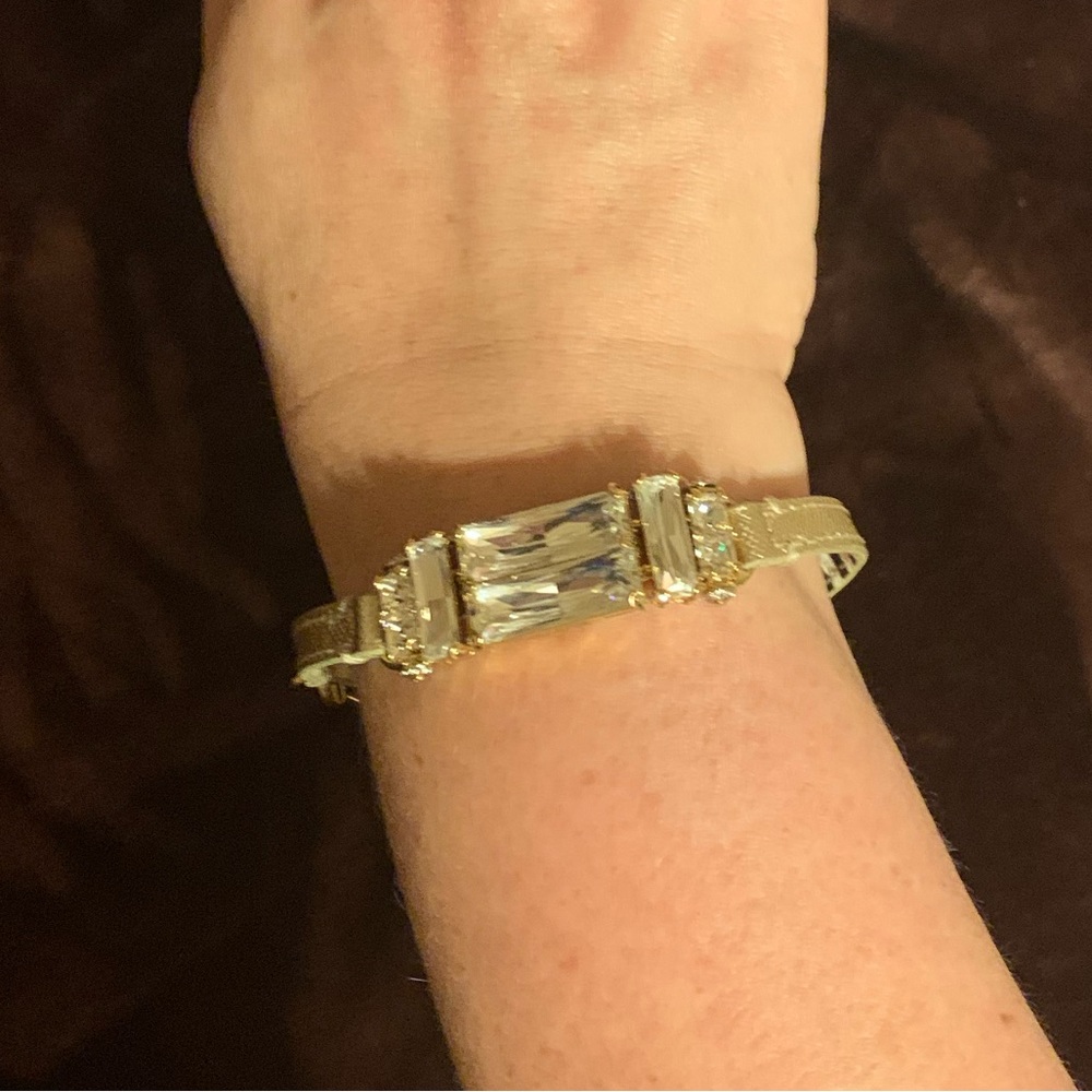 GOLD Leather, hardware and large clear cut stone/ HENRI BENDEL cuff strap